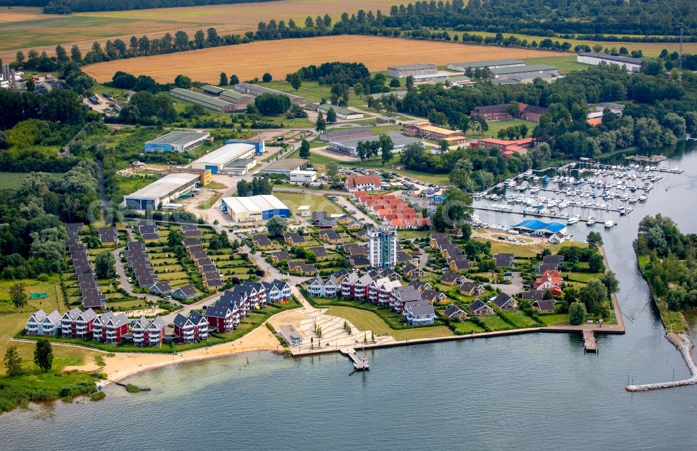 Rechlin from above - Holiday houses of the park Hafendorf Mueritz with Lake Claassee and its marina in Rechlin in the state of Mecklenburg - Western Pomerania