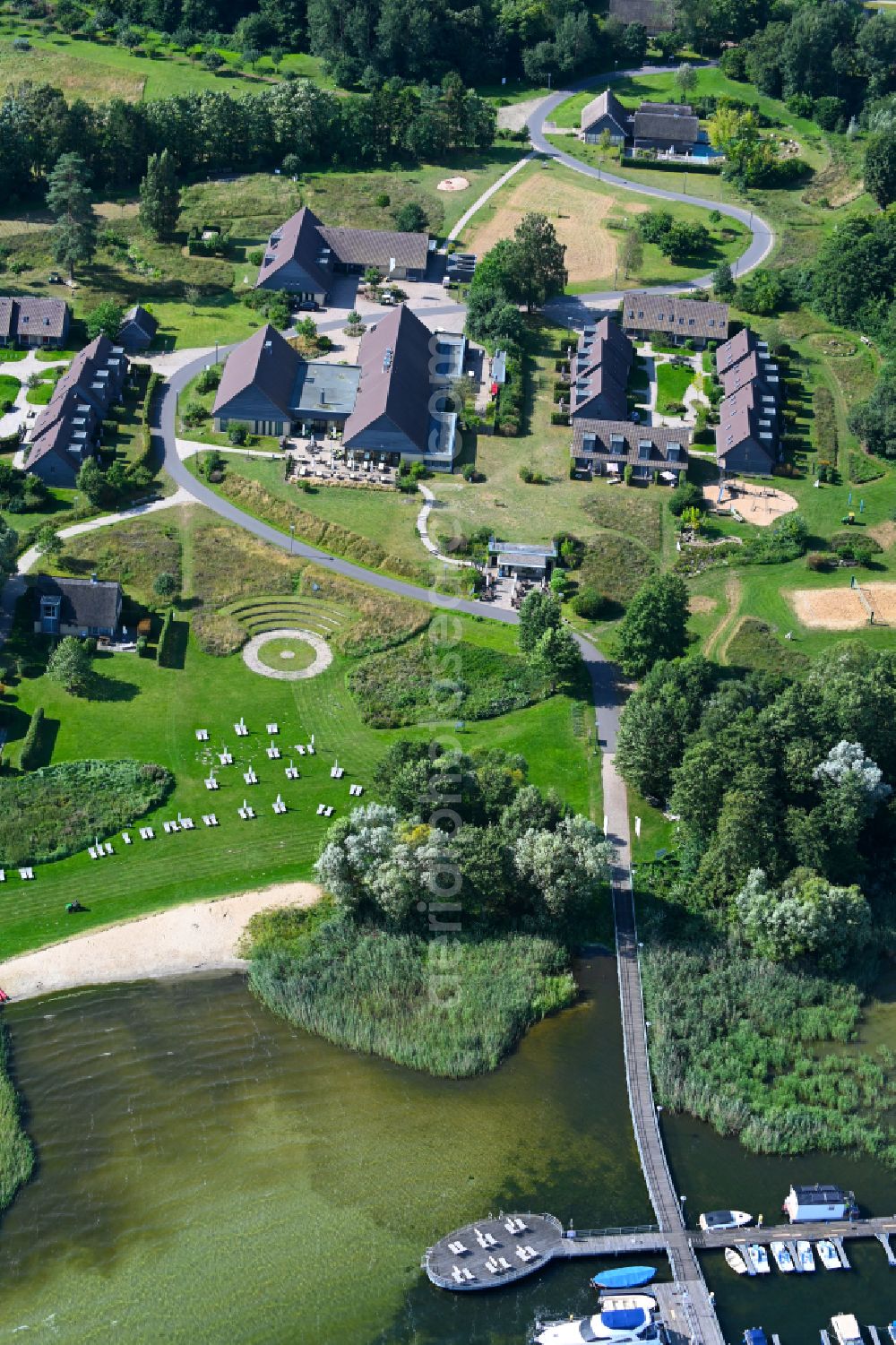 Ganzlin from the bird's eye view: Holiday house plant of the park Vila Vita on Dresenower Muehle in Ganzlin in the state Mecklenburg - Western Pomerania, Germany