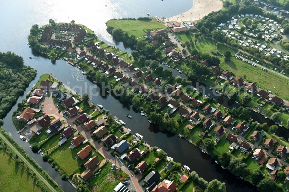 Großefehn from above - Holiday house plant of the park at the lake timmeler sea with a bathing beach and meadows in Grossefehn in the state Lower Saxony