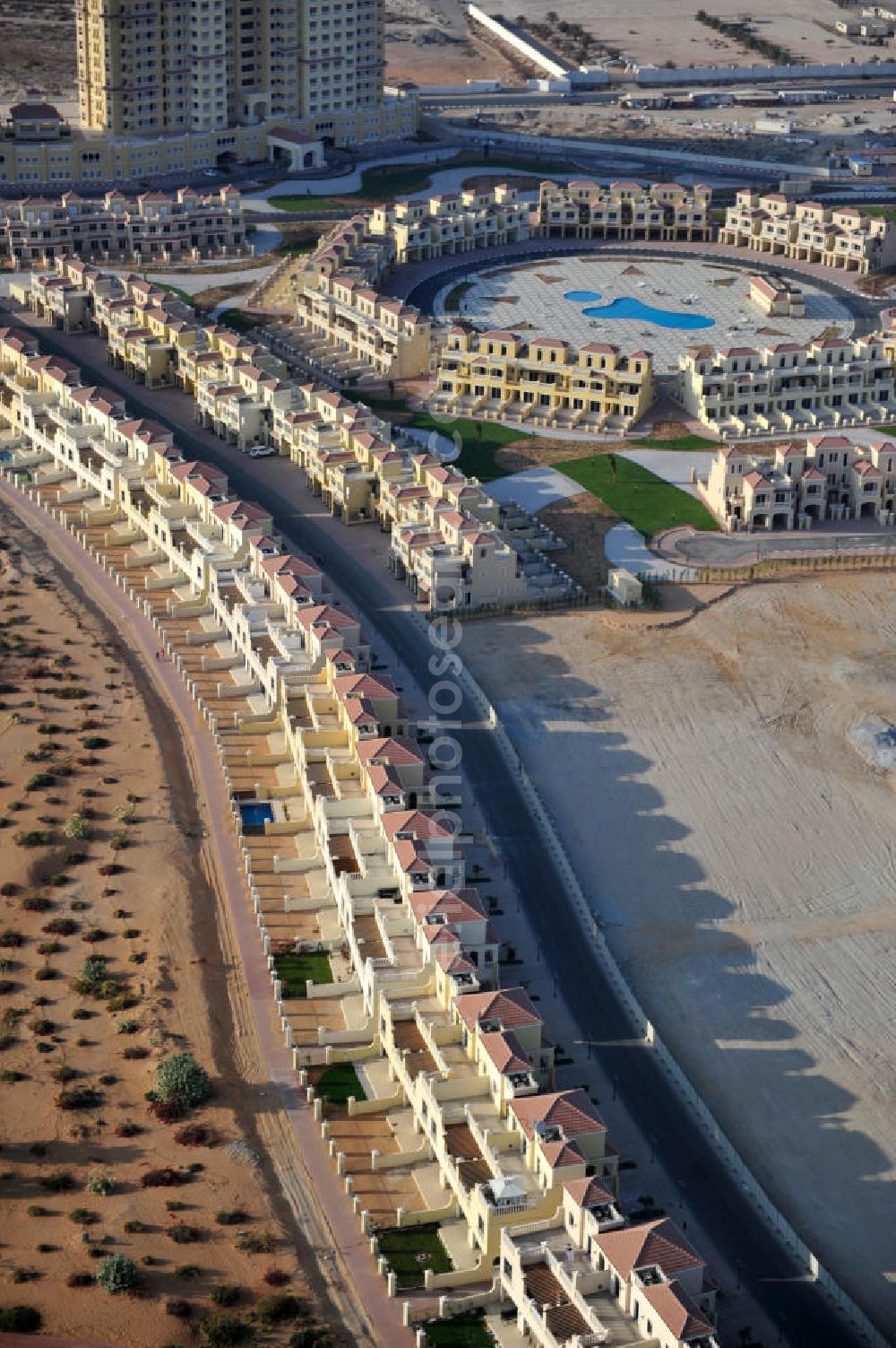 Ras Al Khaimah from above - Settlement of Town House Type A in the arab emirate Ras Al Khaimah. The leisure residences are part of the Al Hamra Village Project, the second largest construction project of Ras Al Khaimah. The project is realized by the state-owned company Al Hamra Real Estate