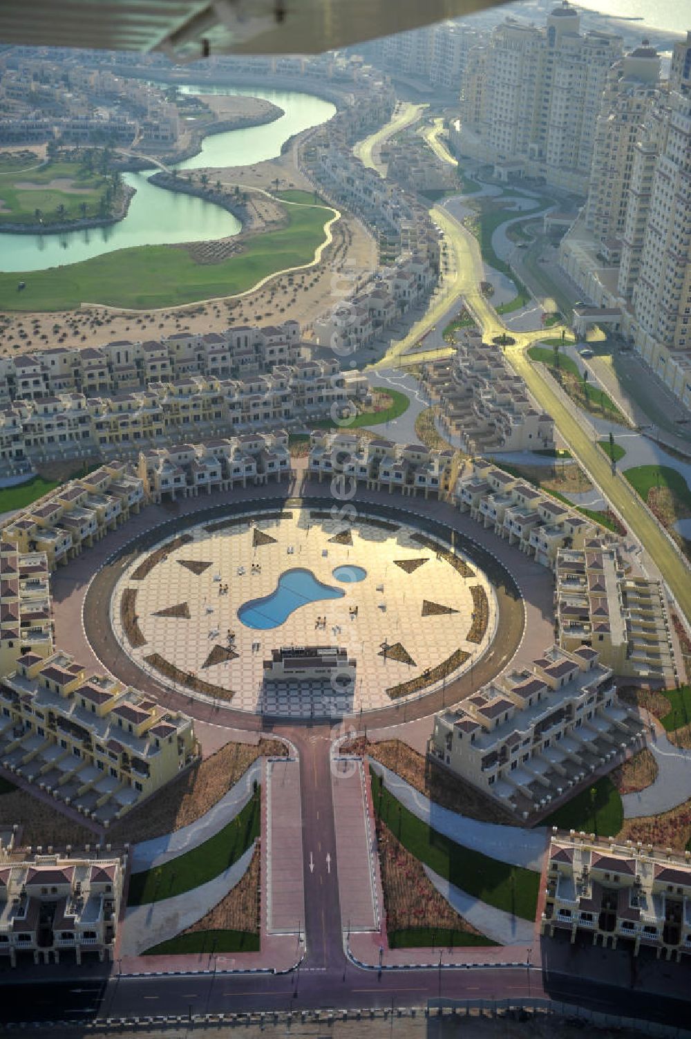 Ras Al Khaimah from above - Settlement of Town House Type C leisure residences in the arab emirate Ras Al Khaimah. The leisure residences are part of the Al Hamra Village Project, the second largest construction project of Ras Al Khaimah. The project is realized by the state-owned company Al Hamra Real Estate