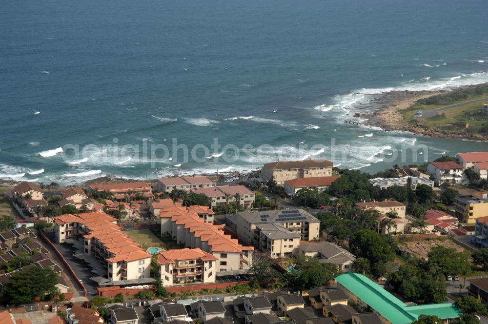 UVONGO from above - Holiday homes and apartments in Uvongo, South Africa. Uvongo is a seaside resort south of Port Shepstone with a lot of hotels and holiday homes. It is the largest residental area on the South Coast of Africa