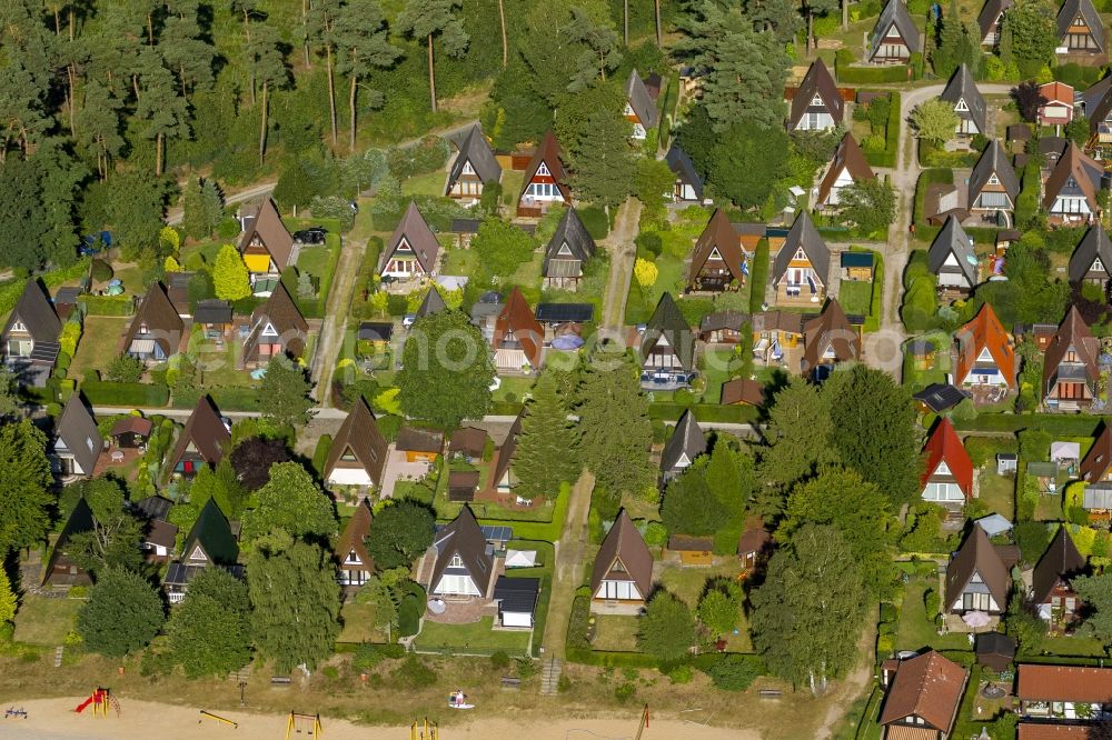 Aerial photograph Isselburg - Holiday homes with pointed roofs in the holiday park Wolfssee in Isselburg in North Rhine-Westphalia