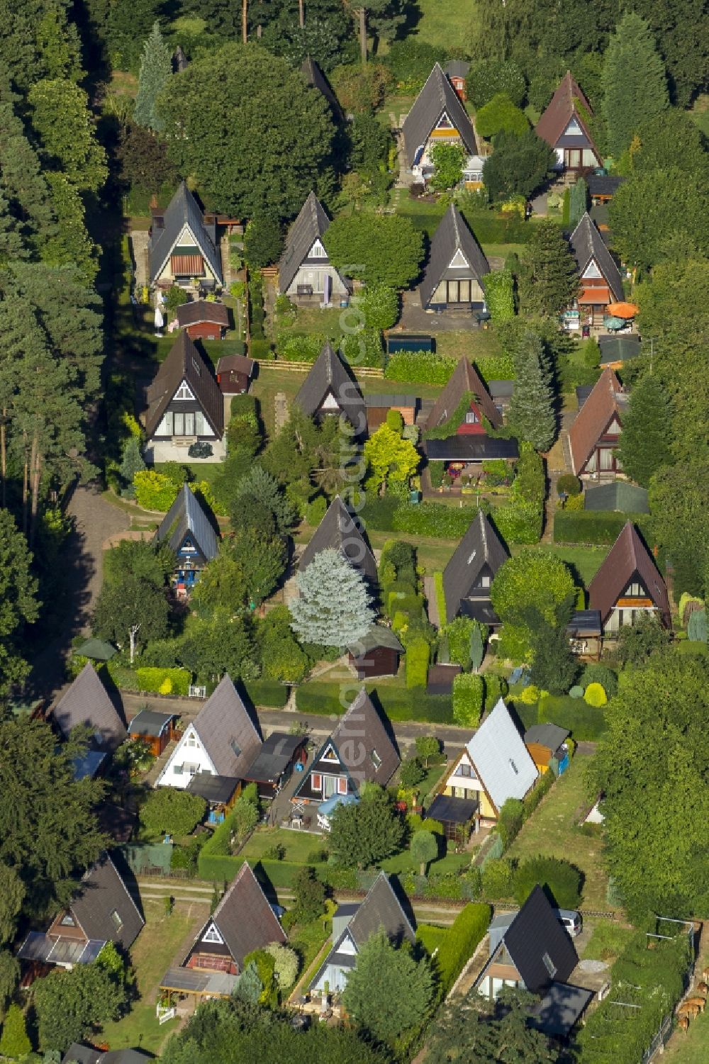 Isselburg from above - Holiday homes with pointed roofs in the holiday park Wolfssee in Isselburg in North Rhine-Westphalia