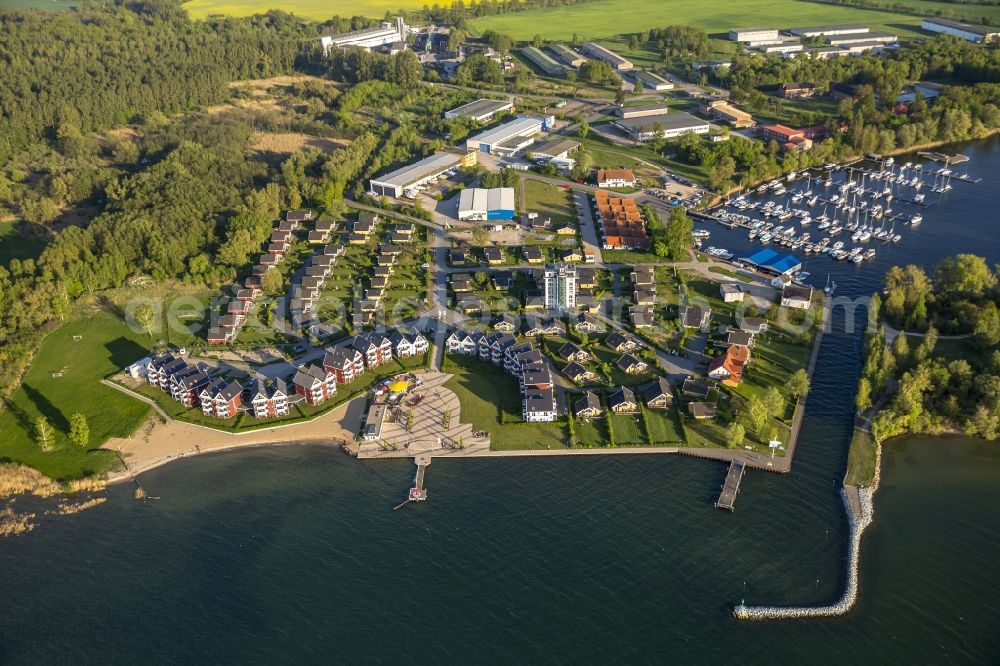 Rechlin from the bird's eye view: View on holiday park Mueritz and harbor in Rechlin Nord on Lake Mueritz. The water belongs to the Mecklenburg Lake District