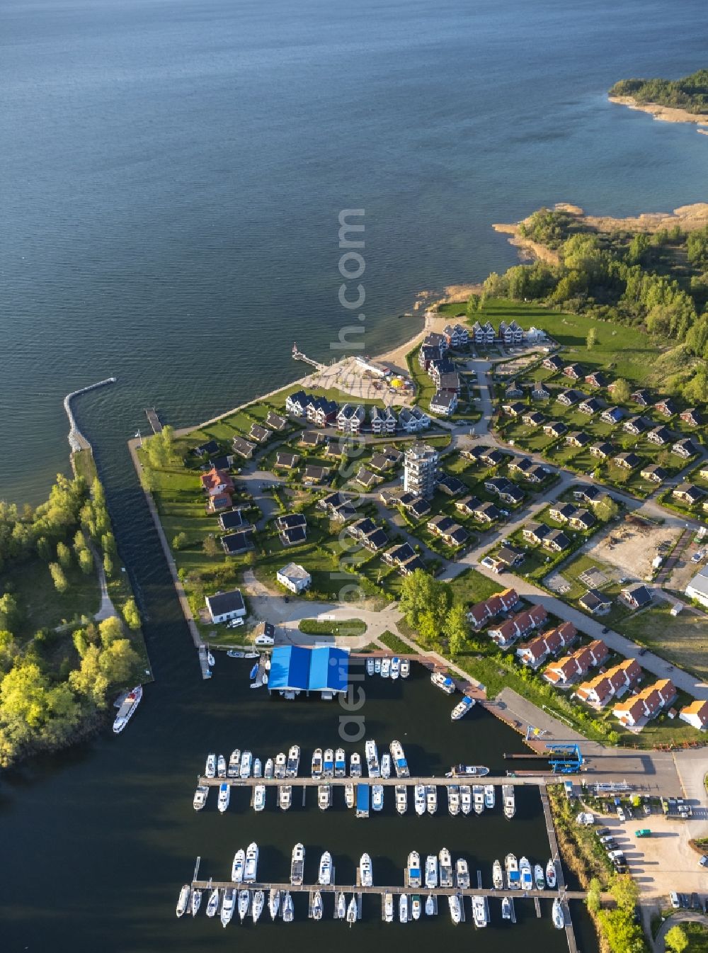 Rechlin from above - View on holiday park Mueritz and harbor in Rechlin Nord on Lake Mueritz. The water belongs to the Mecklenburg Lake District