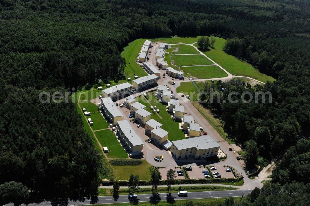 Aerial image OSTSEEBAD GRAL-MÜRITZ - Blick auf den Ferienwohnpark im Küstenwald der HAWO Bauträger KG in unmittelbarer Strandnähe im Ostseeheilbad Graal-Müritz. Aus einer ehemaligen NVA Liegenschaft entstanden bisher in zwei Bauabschnitten attraktive Ferienhäuser und Ferienwohneinheiten zum Verkauf und zur Vermietung. View of the coastal forest of the housing estate developers HAWO KG near the beach in the spa town of Graal Müritz.