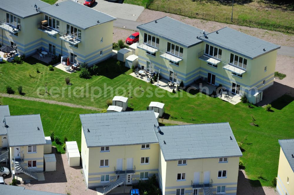 OSTSEEBAD GRAL-MÜRITZ from above - Blick auf den Ferienwohnpark im Küstenwald der HAWO Bauträger KG in unmittelbarer Strandnähe im Ostseeheilbad Graal-Müritz. Aus einer ehemaligen NVA Liegenschaft entstanden bisher in zwei Bauabschnitten attraktive Ferienhäuser und Ferienwohneinheiten zum Verkauf und zur Vermietung. View of the coastal forest of the housing estate developers HAWO KG near the beach in the spa town of Graal Müritz.