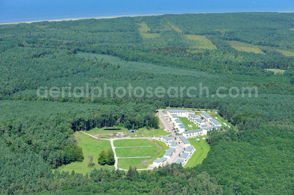 Aerial photograph OSTSEEBAD GRAL-MÜRITZ - Blick auf den Ferienwohnpark im Küstenwald der HAWO Bauträger KG in unmittelbarer Strandnähe im Ostseeheilbad Graal-Müritz. Aus einer ehemaligen NVA Liegenschaft entstanden bisher in zwei Bauabschnitten attraktive Ferienhäuser und Ferienwohneinheiten zum Verkauf und zur Vermietung. View of the coastal forest of the housing estate developers HAWO KG near the beach in the spa town of Graal Müritz.