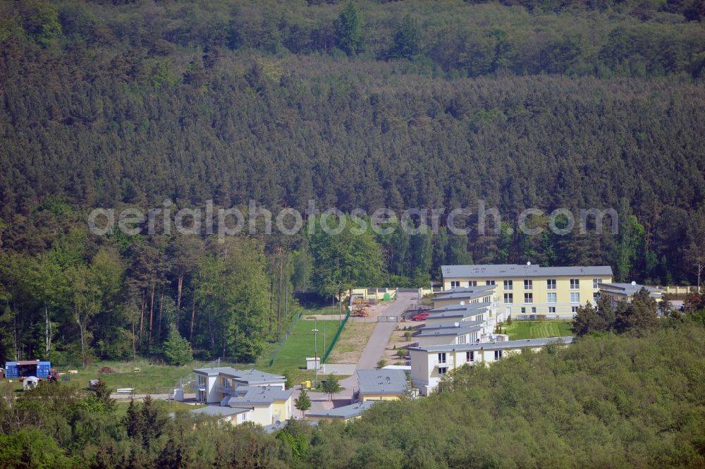 Seeheilbad Graal-Müritz from above - Blick auf den Ferienwohnpark im Küstenwald der HAWO Bauträger KG in unmittelbarer Strandnähe im Ostseeheilbad Graal-Müritz. Aus einer ehemaligen NVA Liegenschaft entstanden bisher in zwei Bauabschnitten attraktive Ferienhäuser und Ferienwohneinheiten zum Verkauf und zur Vermietung. View of the coastal forest of the housing estate developers HAWO KG near the beach in the spa town of Graal Müritz.