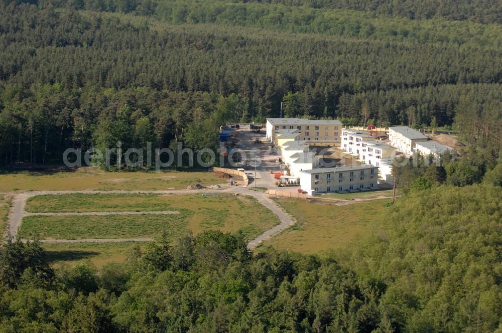 Aerial photograph Graal-Müritz - Blick auf den Ferienwohnpark im Küstenwald der HAWO Bauträger KG in unmittelbarer Strandnähe im Ostseeheilbad Graal-Müritz. Aus einer ehemaligen NVA Liegenschaft entstanden attraktive Ferienhäuser und Ferienwohneinheiten zum Verkauf und zur Vermietung