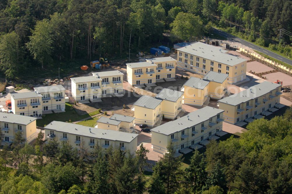 Aerial photograph Graal-Müritz - Blick auf den Ferienwohnpark im Küstenwald der HAWO Bauträger KG in unmittelbarer Strandnähe im Ostseeheilbad Graal-Müritz. Aus einer ehemaligen NVA Liegenschaft entstanden attraktive Ferienhäuser und Ferienwohneinheiten zum Verkauf und zur Vermietung