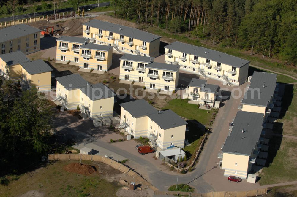 Graal-Müritz from the bird's eye view: Blick auf den Ferienwohnpark im Küstenwald der HAWO Bauträger KG in unmittelbarer Strandnähe im Ostseeheilbad Graal-Müritz. Aus einer ehemaligen NVA Liegenschaft entstanden attraktive Ferienhäuser und Ferienwohneinheiten zum Verkauf und zur Vermietung