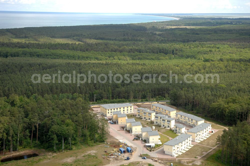 Ostseebad Graal-Müritz from the bird's eye view: Blick auf den Ferienwohnpark im Küstenwald der HAWO Bauträger KG in unmittelbarer Strandnähe im Ostseeheilbad Graal-Müritz. Aus einer ehemaligen NVA Liegenschaft entstanden attraktive Ferienhäuser und Ferienwohneinheiten zum Verkauf und zur Vermietung