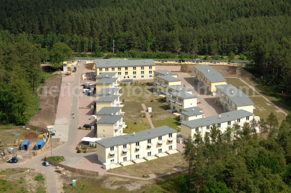 Ostseebad Graal-Müritz from the bird's eye view: Blick auf den Ferienwohnpark im Küstenwald der HAWO Bauträger KG in unmittelbarer Strandnähe im Ostseeheilbad Graal-Müritz. Aus einer ehemaligen NVA Liegenschaft entstanden attraktive Ferienhäuser und Ferienwohneinheiten zum Verkauf und zur Vermietung