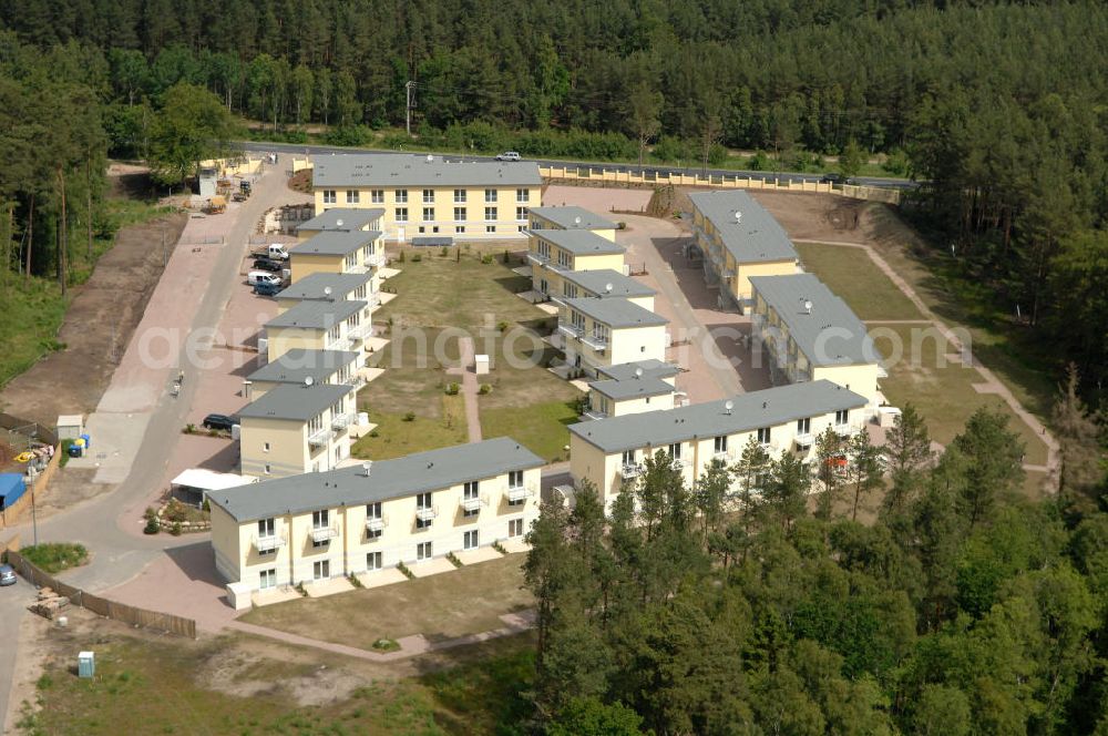 Aerial photograph Ostseebad Graal-Müritz - Blick auf den Ferienwohnpark im Küstenwald der HAWO Bauträger KG in unmittelbarer Strandnähe im Ostseeheilbad Graal-Müritz. Aus einer ehemaligen NVA Liegenschaft entstanden attraktive Ferienhäuser und Ferienwohneinheiten zum Verkauf und zur Vermietung