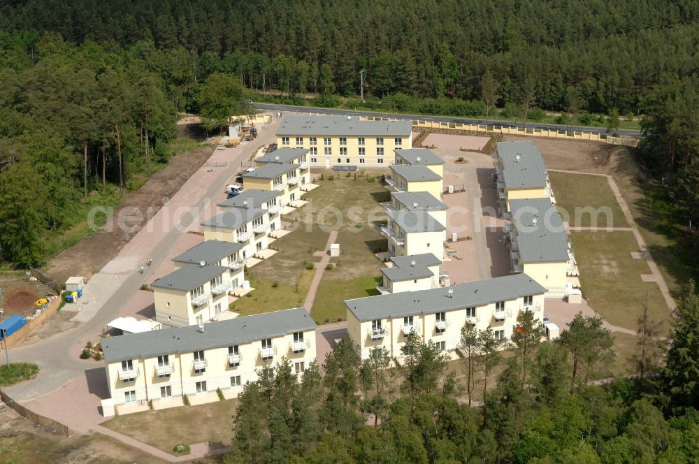 Ostseebad Graal-Müritz from above - Blick auf den Ferienwohnpark im Küstenwald der HAWO Bauträger KG in unmittelbarer Strandnähe im Ostseeheilbad Graal-Müritz. Aus einer ehemaligen NVA Liegenschaft entstanden attraktive Ferienhäuser und Ferienwohneinheiten zum Verkauf und zur Vermietung