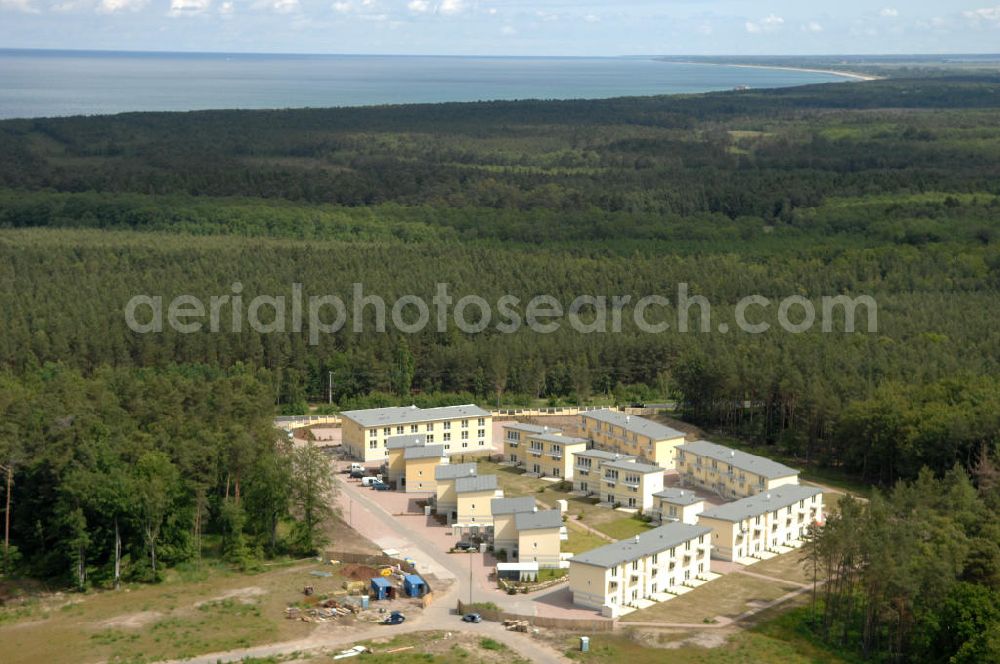 Ostseebad Graal-Müritz from the bird's eye view: Blick auf den Ferienwohnpark im Küstenwald der HAWO Bauträger KG in unmittelbarer Strandnähe im Ostseeheilbad Graal-Müritz. Aus einer ehemaligen NVA Liegenschaft entstanden attraktive Ferienhäuser und Ferienwohneinheiten zum Verkauf und zur Vermietung