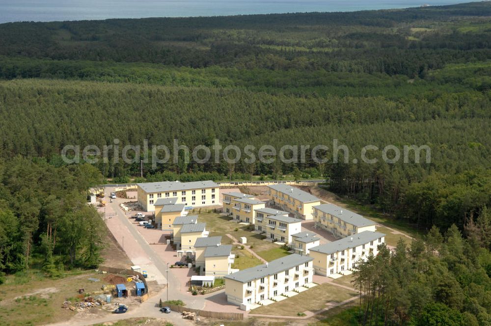 Aerial photograph Ostseebad Graal-Müritz - Blick auf den Ferienwohnpark im Küstenwald der HAWO Bauträger KG in unmittelbarer Strandnähe im Ostseeheilbad Graal-Müritz. Aus einer ehemaligen NVA Liegenschaft entstanden attraktive Ferienhäuser und Ferienwohneinheiten zum Verkauf und zur Vermietung