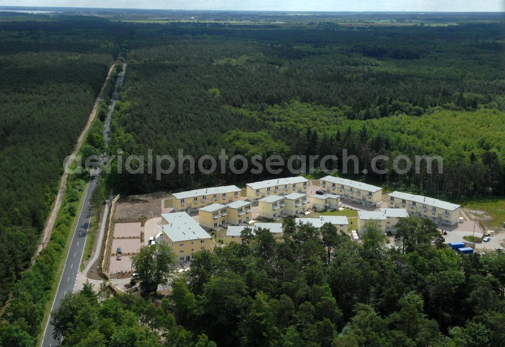 Ostseebad Graal-Müritz from above - Blick auf den Ferienwohnpark im Küstenwald der HAWO Bauträger KG in unmittelbarer Strandnähe im Ostseeheilbad Graal-Müritz. Aus einer ehemaligen NVA Liegenschaft entstanden attraktive Ferienhäuser und Ferienwohneinheiten zum Verkauf und zur Vermietung