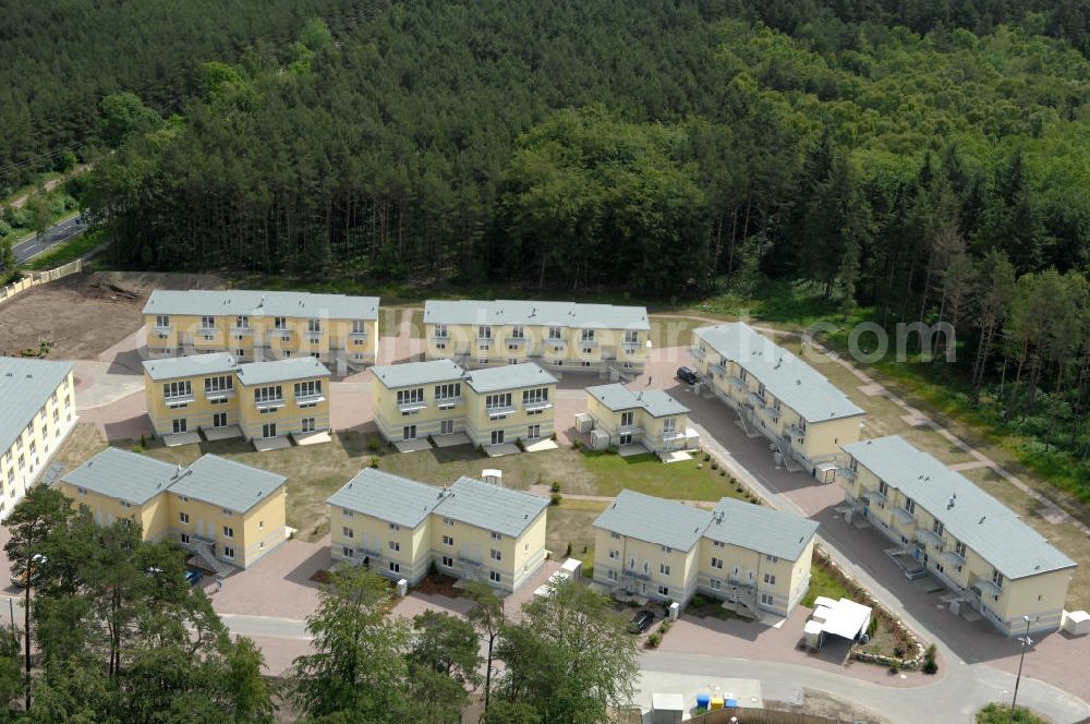 Ostseebad Graal-Müritz from the bird's eye view: Blick auf den Ferienwohnpark im Küstenwald der HAWO Bauträger KG in unmittelbarer Strandnähe im Ostseeheilbad Graal-Müritz. Aus einer ehemaligen NVA Liegenschaft entstanden attraktive Ferienhäuser und Ferienwohneinheiten zum Verkauf und zur Vermietung