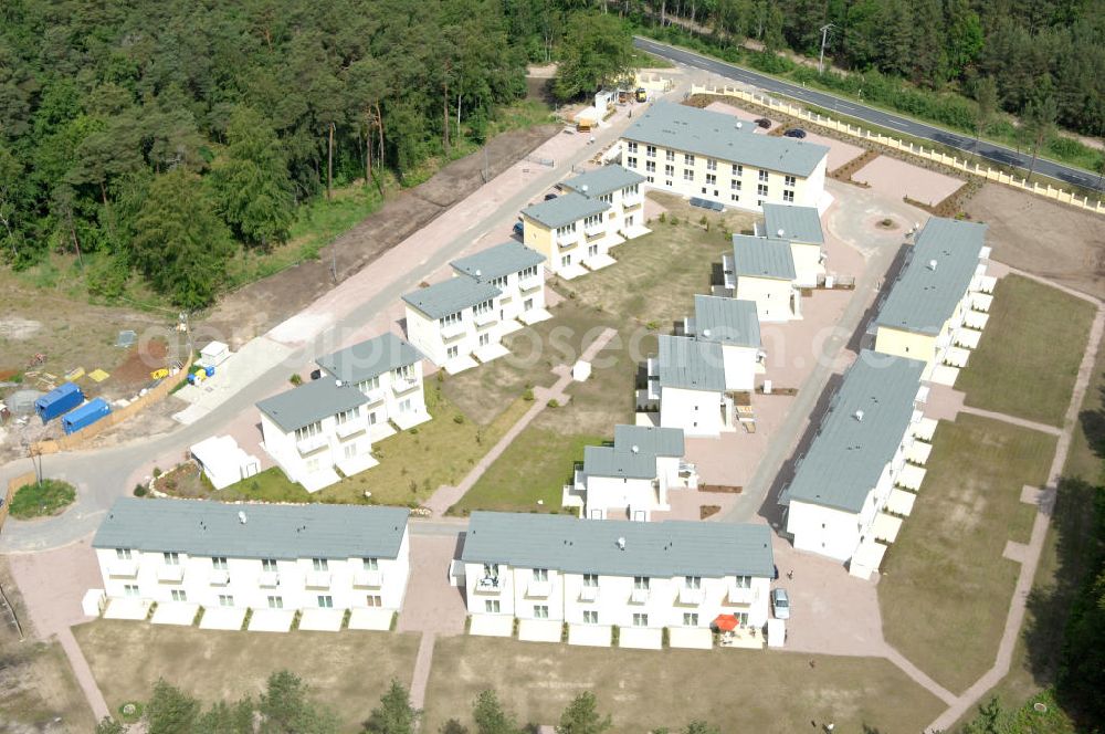 Aerial photograph Ostseebad Graal-Müritz - Blick auf den Ferienwohnpark im Küstenwald der HAWO Bauträger KG in unmittelbarer Strandnähe im Ostseeheilbad Graal-Müritz. Aus einer ehemaligen NVA Liegenschaft entstanden attraktive Ferienhäuser und Ferienwohneinheiten zum Verkauf und zur Vermietung