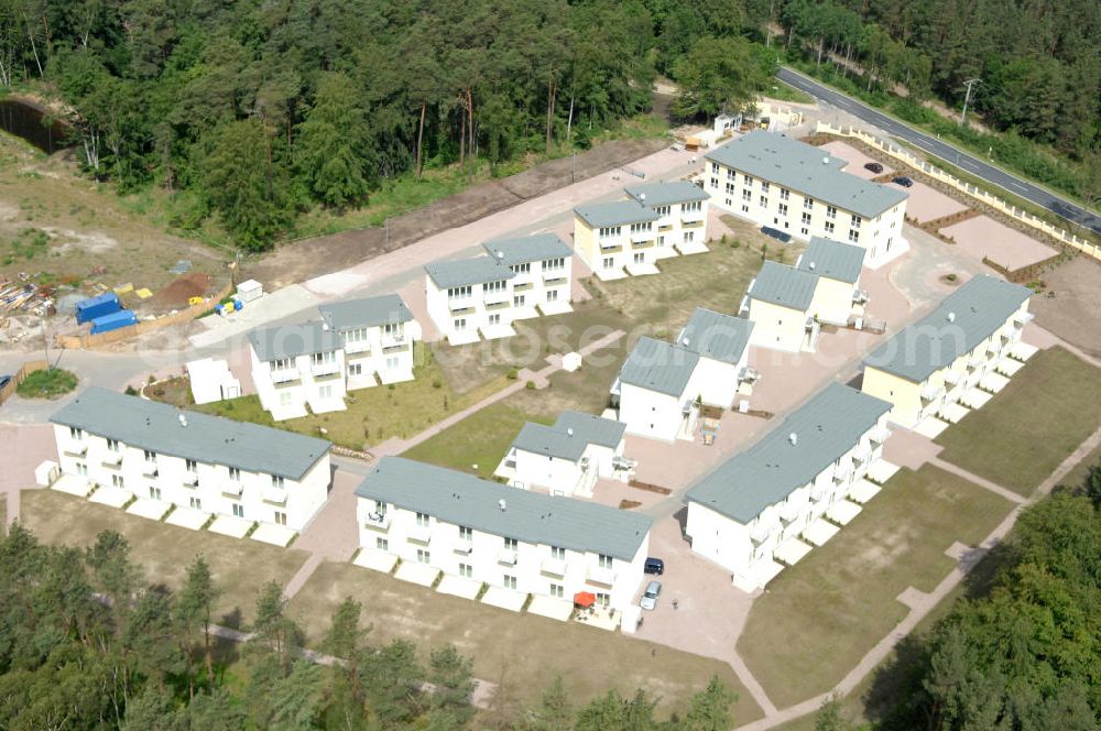 Ostseebad Graal-Müritz from above - Blick auf den Ferienwohnpark im Küstenwald der HAWO Bauträger KG in unmittelbarer Strandnähe im Ostseeheilbad Graal-Müritz. Aus einer ehemaligen NVA Liegenschaft entstanden attraktive Ferienhäuser und Ferienwohneinheiten zum Verkauf und zur Vermietung