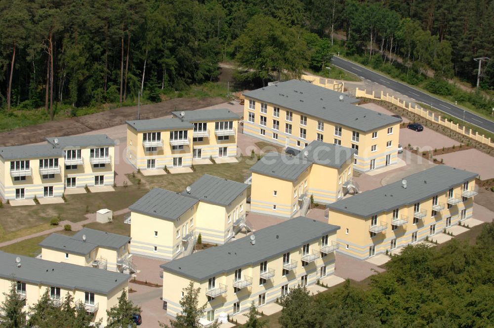 Aerial photograph Ostseebad Graal-Müritz - Blick auf den Ferienwohnpark im Küstenwald der HAWO Bauträger KG in unmittelbarer Strandnähe im Ostseeheilbad Graal-Müritz. Aus einer ehemaligen NVA Liegenschaft entstanden attraktive Ferienhäuser und Ferienwohneinheiten zum Verkauf und zur Vermietung