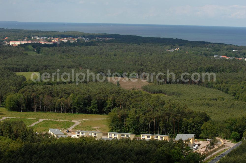 Aerial photograph Ostseebad Graal-Müritz - Blick auf den Ferienwohnpark im Küstenwald der HAWO Bauträger KG in unmittelbarer Strandnähe im Ostseeheilbad Graal-Müritz. Aus einer ehemaligen NVA Liegenschaft entstanden attraktive Ferienhäuser und Ferienwohneinheiten zum Verkauf und zur Vermietung