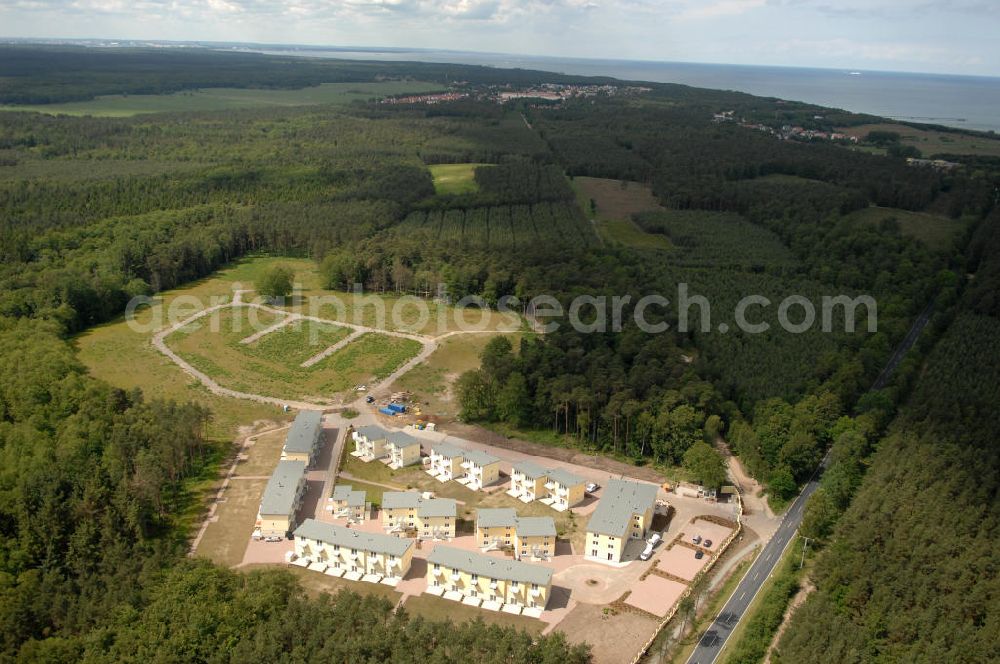 Ostseebad Graal-Müritz from the bird's eye view: Blick auf den Ferienwohnpark im Küstenwald der HAWO Bauträger KG in unmittelbarer Strandnähe im Ostseeheilbad Graal-Müritz. Aus einer ehemaligen NVA Liegenschaft entstanden attraktive Ferienhäuser und Ferienwohneinheiten zum Verkauf und zur Vermietung