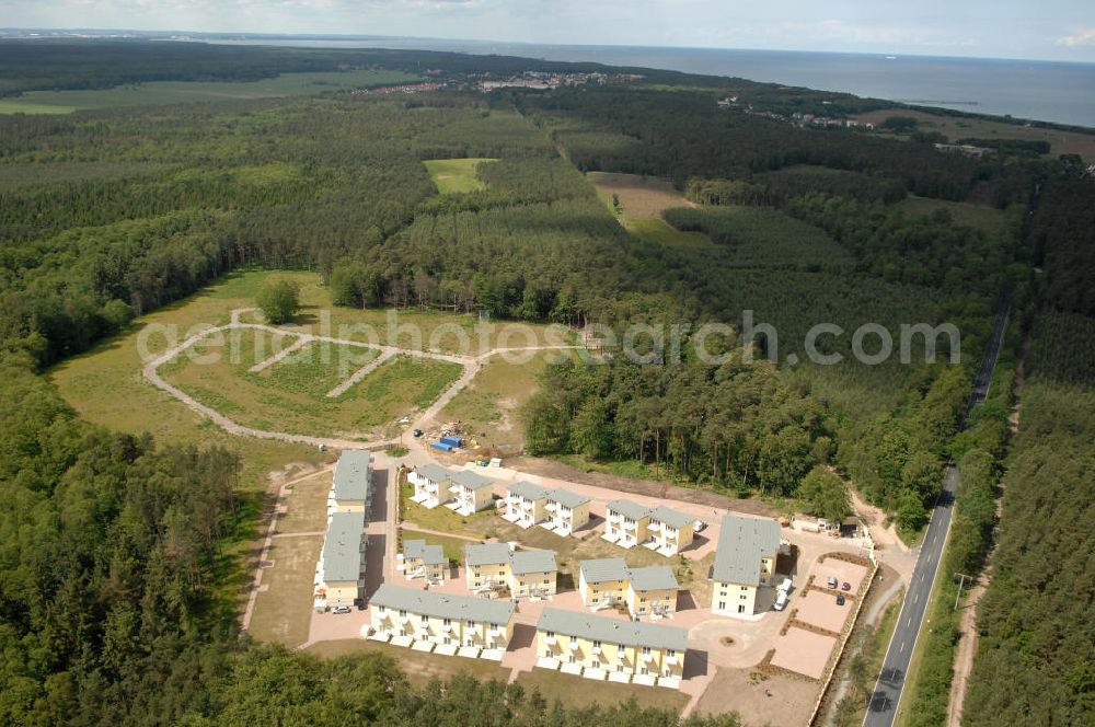 Ostseebad Graal-Müritz from the bird's eye view: Blick auf den Ferienwohnpark im Küstenwald der HAWO Bauträger KG in unmittelbarer Strandnähe im Ostseeheilbad Graal-Müritz. Aus einer ehemaligen NVA Liegenschaft entstanden attraktive Ferienhäuser und Ferienwohneinheiten zum Verkauf und zur Vermietung