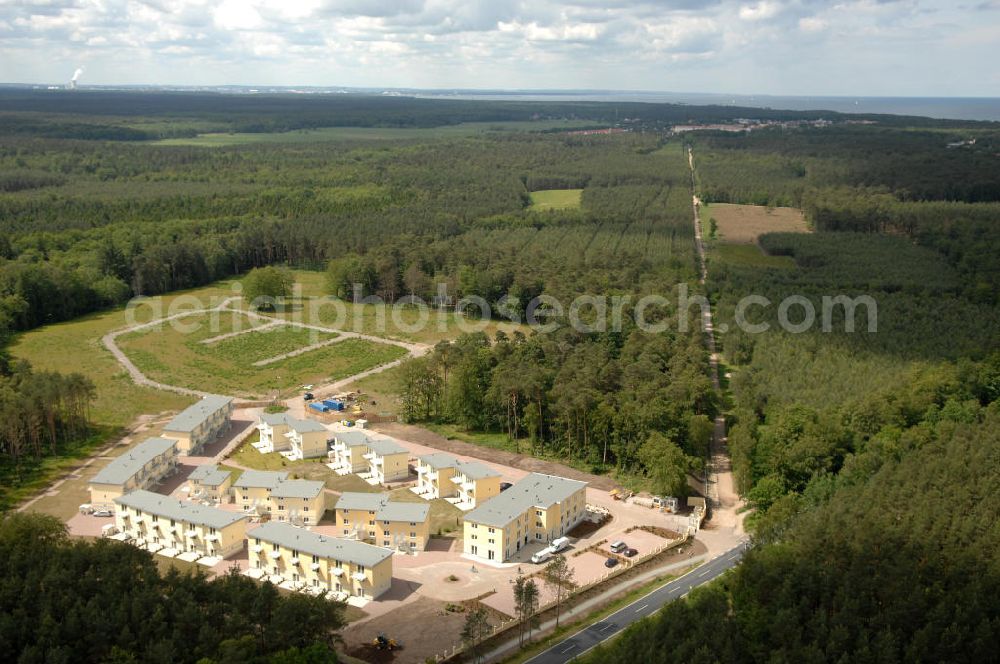 Aerial photograph Ostseebad Graal-Müritz - Blick auf den Ferienwohnpark im Küstenwald der HAWO Bauträger KG in unmittelbarer Strandnähe im Ostseeheilbad Graal-Müritz. Aus einer ehemaligen NVA Liegenschaft entstanden attraktive Ferienhäuser und Ferienwohneinheiten zum Verkauf und zur Vermietung