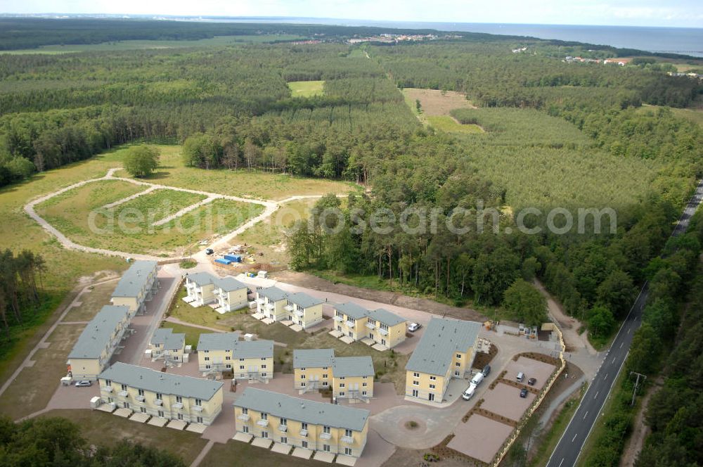 Ostseebad Graal-Müritz from the bird's eye view: Blick auf den Ferienwohnpark im Küstenwald der HAWO Bauträger KG in unmittelbarer Strandnähe im Ostseeheilbad Graal-Müritz. Aus einer ehemaligen NVA Liegenschaft entstanden attraktive Ferienhäuser und Ferienwohneinheiten zum Verkauf und zur Vermietung