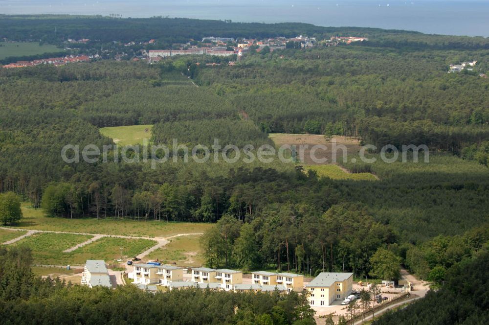 Ostseebad Graal-Müritz from the bird's eye view: Blick auf den Ferienwohnpark im Küstenwald der HAWO Bauträger KG in unmittelbarer Strandnähe im Ostseeheilbad Graal-Müritz. Aus einer ehemaligen NVA Liegenschaft entstanden attraktive Ferienhäuser und Ferienwohneinheiten zum Verkauf und zur Vermietung