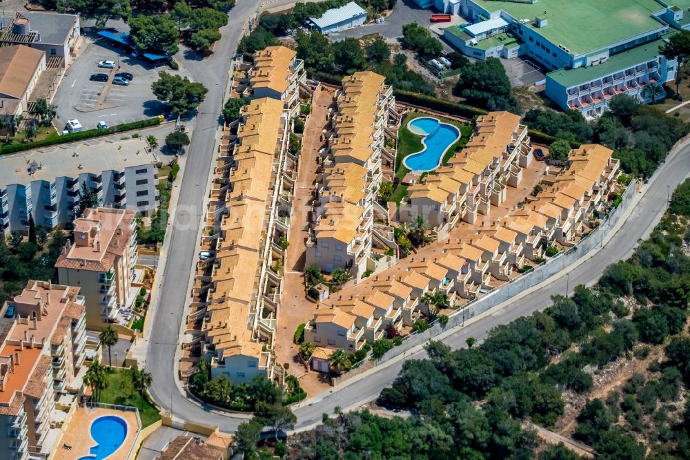 Cales de Mallorca from above - Building of an apartment building used as an apartment complex on Carrer de Cala Domingos in Cales de Mallorca in Balearic island of Mallorca, Spain