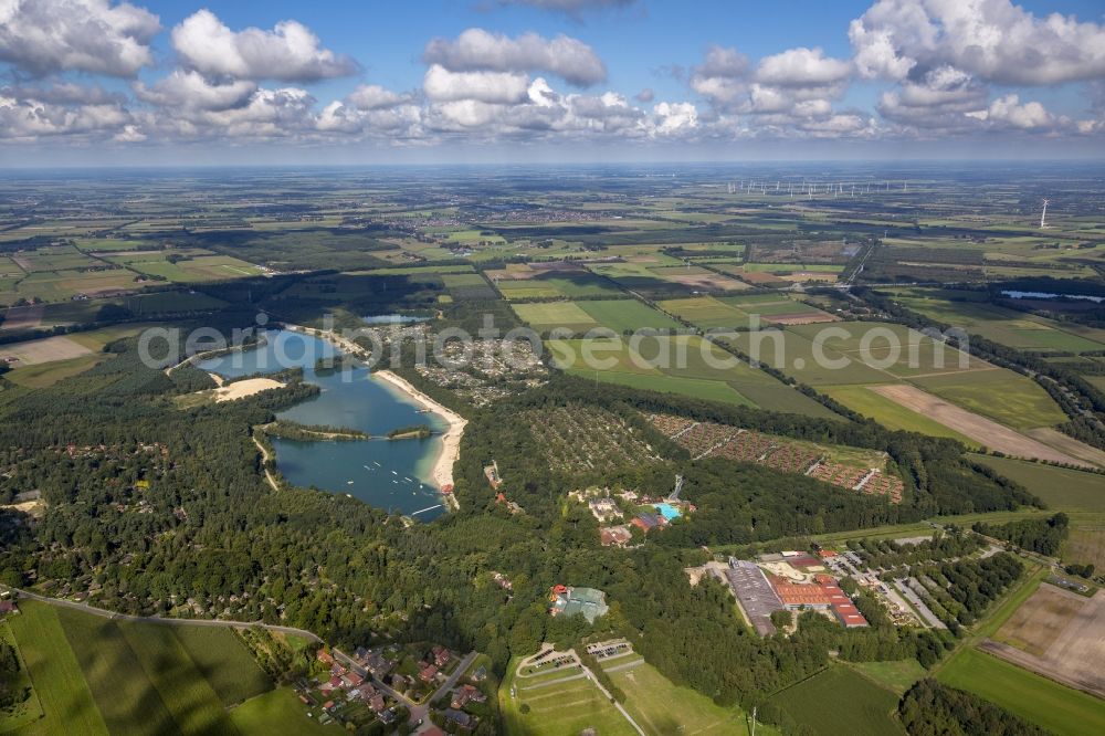 Aerial image Haren Ems - The Dankern See next to the holiday resort Schloss Dankern. On the surrounding fields the shadows of the clouds are visible