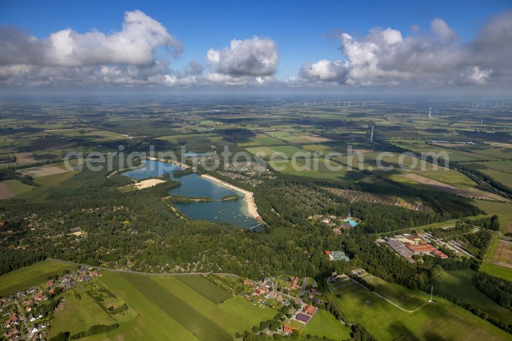 Aerial image Haren Ems - The Dankern See next to the holiday resort Schloss Dankern. On the surrounding fields the shadows of the clouds are visible