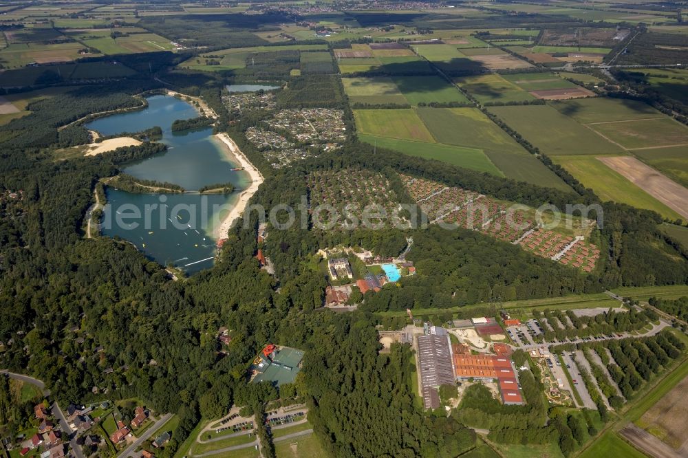 Aerial photograph Haren Ems - The Dankern See next to the holiday resort Schloss Dankern. On the surrounding fields the shadows of the clouds are visible