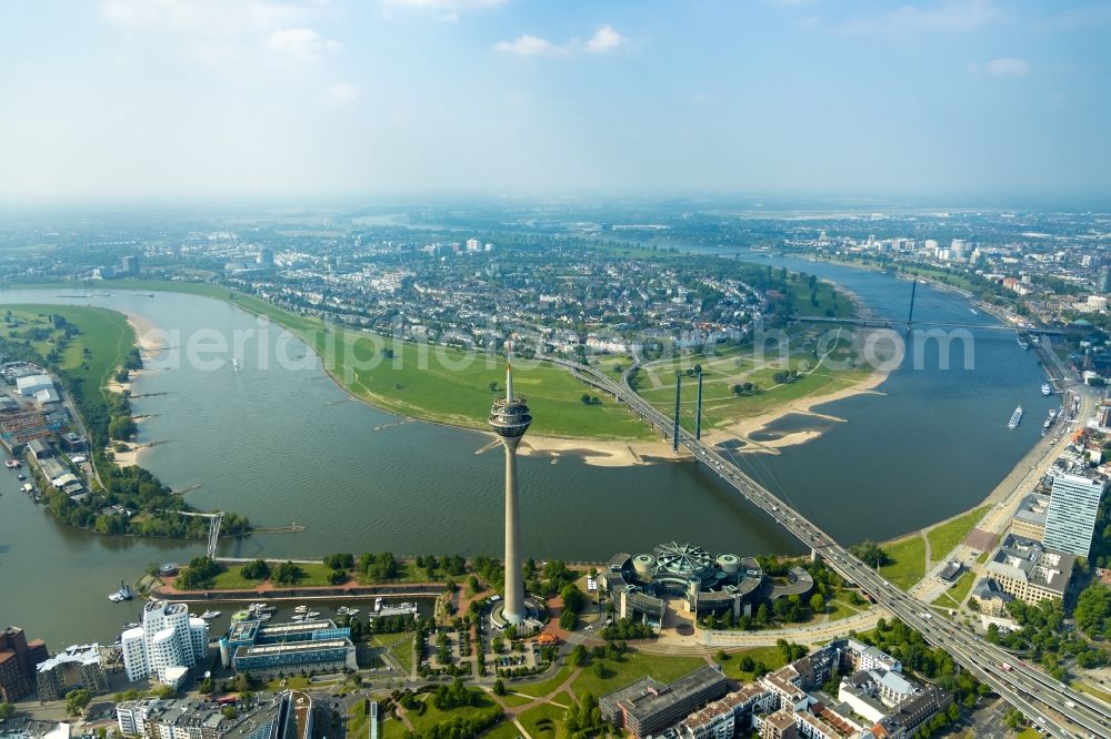 Düsseldorf from the bird's eye view: Television Tower Rheinturm and die Rheinkniebruecke in Duesseldorf in the state North Rhine-Westphalia, Germany