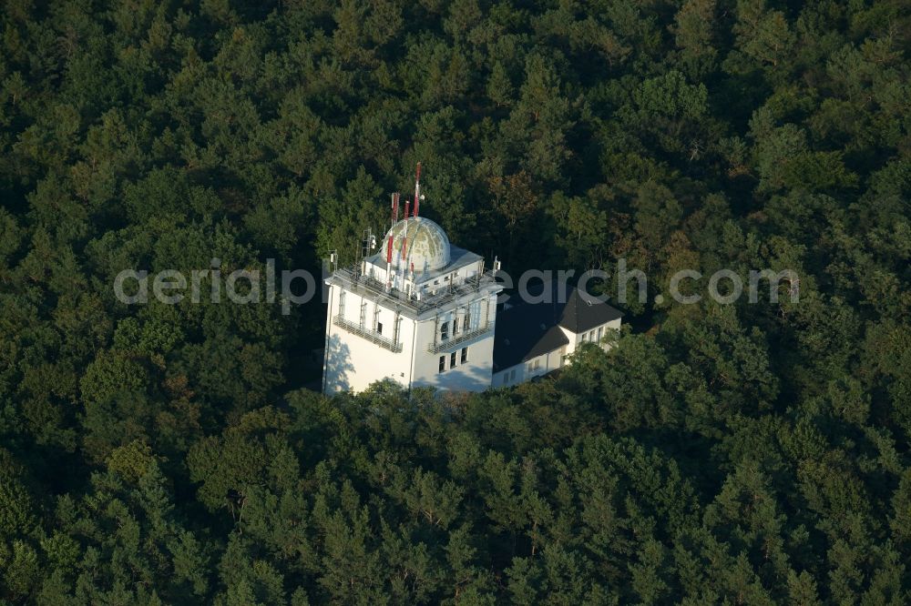 Berlin from the bird's eye view: Television Tower Mueggelberge in the district of Treptwo-Koepenick in Berlin in Germany. The originally planned Television Tower of Berlin is located in a forest with a dome on the top