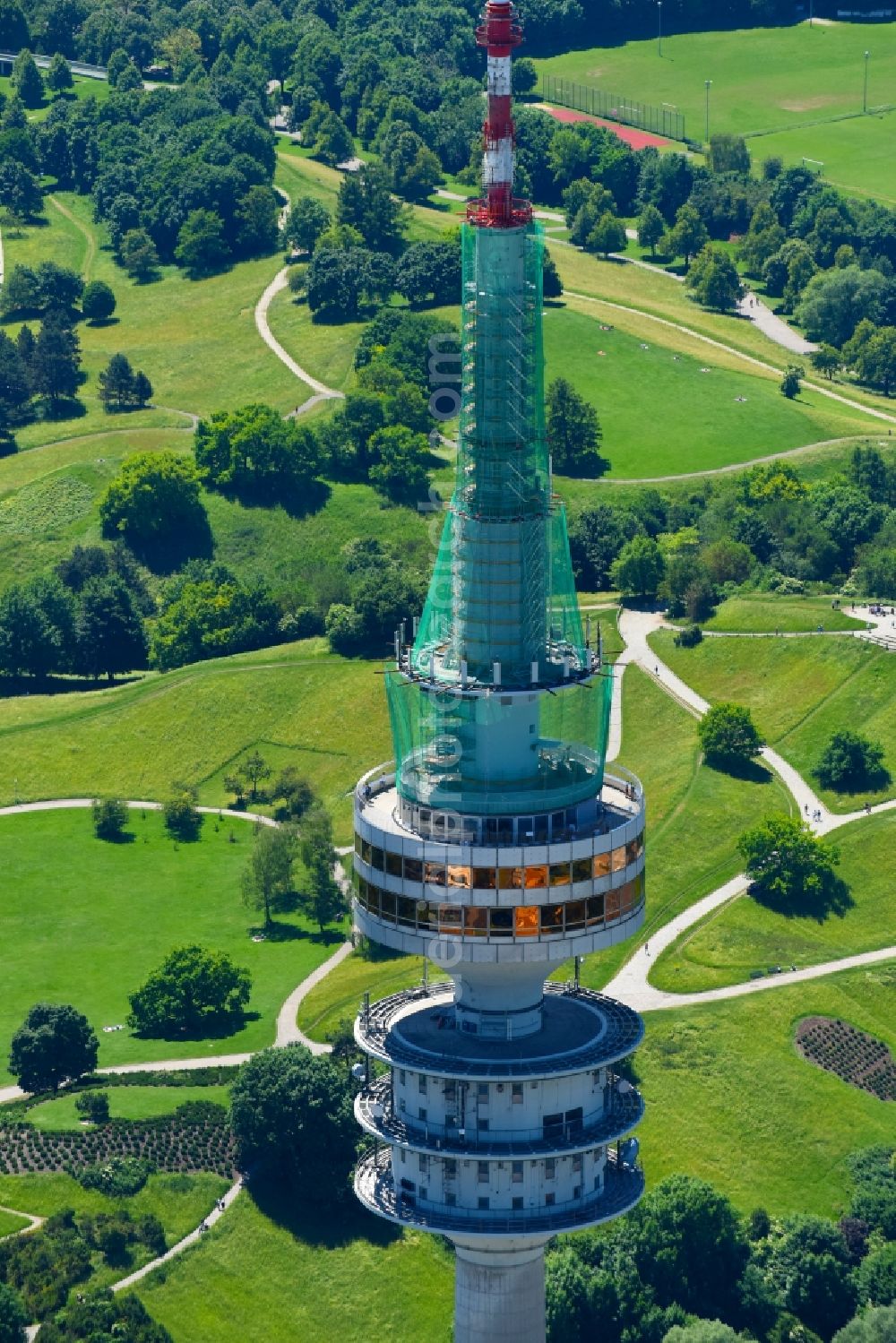 München from above - Television Tower Olympiaturm in Olympiapark on Spiridon-Louis-Ring in Munich in the state Bavaria, Germany