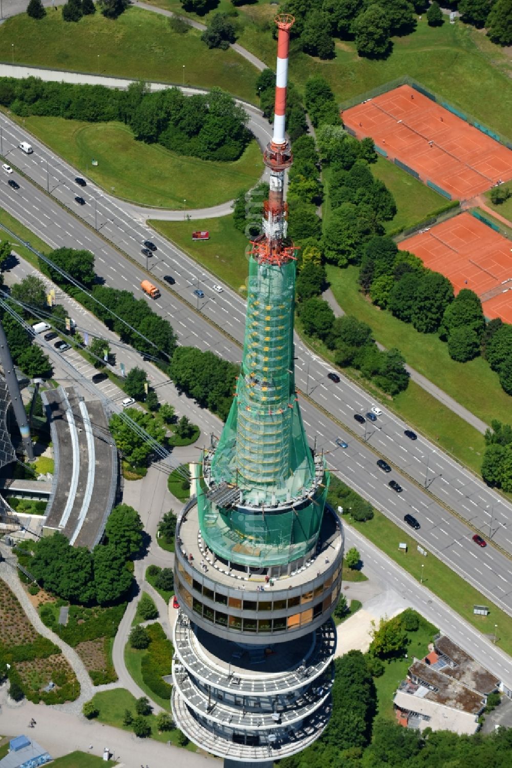 München from above - Television Tower Olympiaturm in Olympiapark on Spiridon-Louis-Ring in Munich in the state Bavaria, Germany