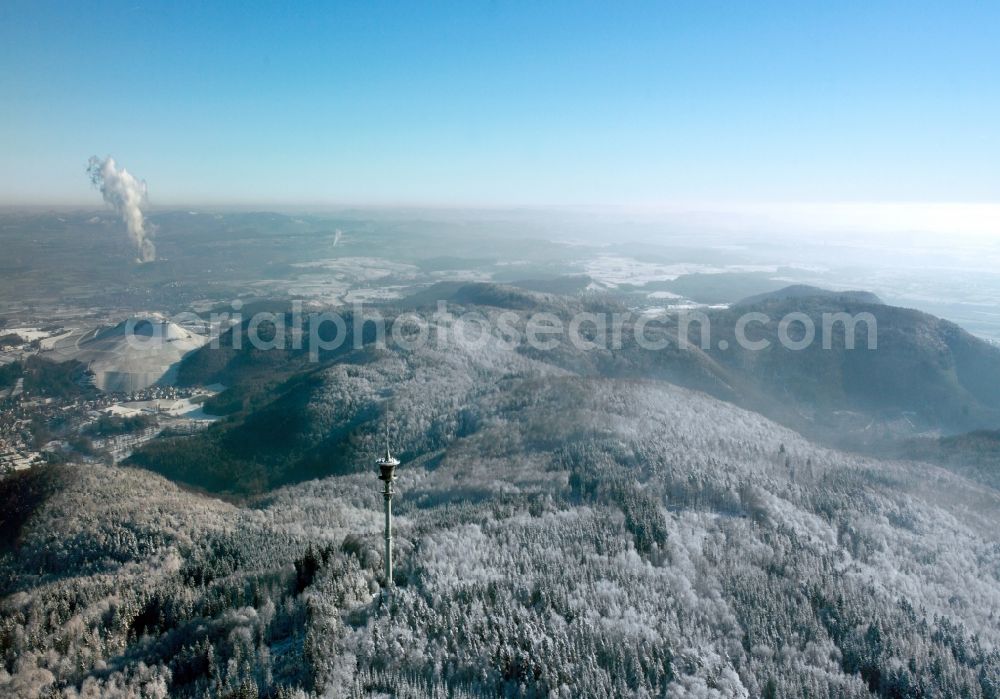 Cleebronn from above - Telecommunications tower on the snow-covered Stromberg in the borough of Cleebronn in the state of Baden-Wuerttemberg. The tower (called Cleebronn or Brackenheim 1) is a broadcasting tower on the highest mountain of the Stromberg mountain range. It was built in 1969 by the German federal post and is listed since 2004. The tower is owned by the Deutsche Funkturm