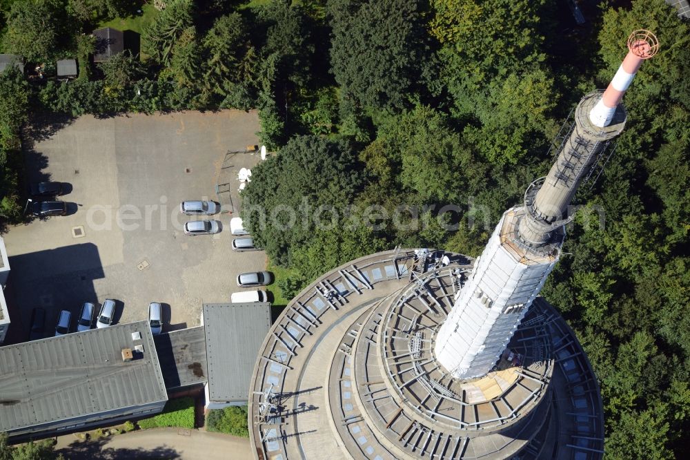 Aerial image Kiel - Radio tower in Vieburger woods in Kiel in Schleswig-Holstein. Currently, renovation work will take place through the Werner Diener GmbH & Co. Industrieanstrich KG