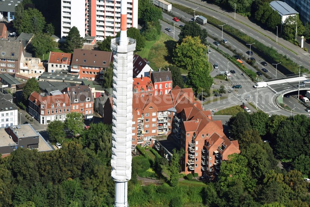 Aerial image Kiel - Radio tower in Vieburger woods in Kiel in Schleswig-Holstein. Currently, renovation work will take place through the Werner Diener GmbH & Co. Industrieanstrich KG