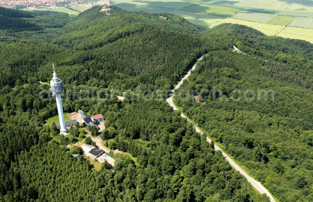 Aerial image Kyffhäuserland - On the highest point of Kyffhaeuser in Thuringia the Kulpenberg is the TV tower. On behalf of the German Telekom are here Kyffhaeuser broadcast by radio and television programs. The tower once housed a tower Cafe is no longer open to the public today. In the background the building at the Rothenburg castle can be seen