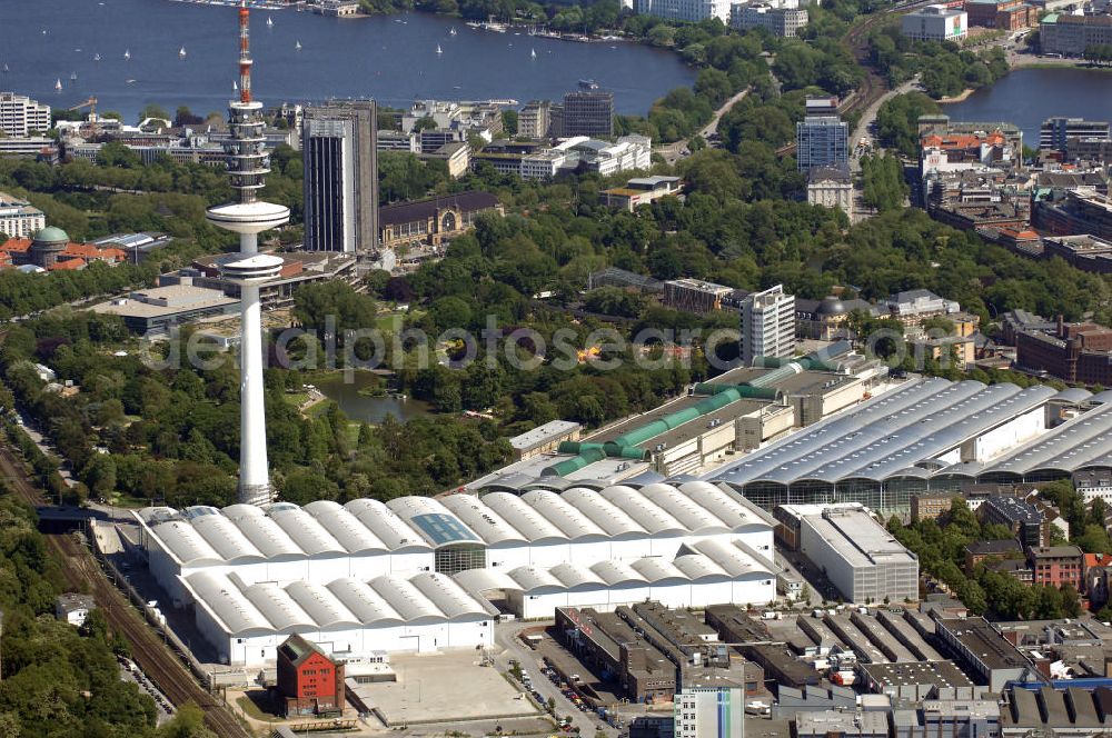 Hamburg from the bird's eye view: Blick auf den Fernsehturm Hamburg am Messe-Gelände im Stadtteil St. Pauli. Im Hintergrund die Außenalster. Der 279 Meter hohe Heinrich-Hertz-Turm wurde von 1965 bis 1968 errichtet. Umgangssprachlich wird er in Anlehnung an den Michel der Michaeliskirche Tele-Michel genannt. Seit 2001 ist der Turm aus brandschutzrechtlichen Gründen für die Öffentlichkeit unzugänglich. Adresse: Lagerstraße 2-8, 20357 Hamburg