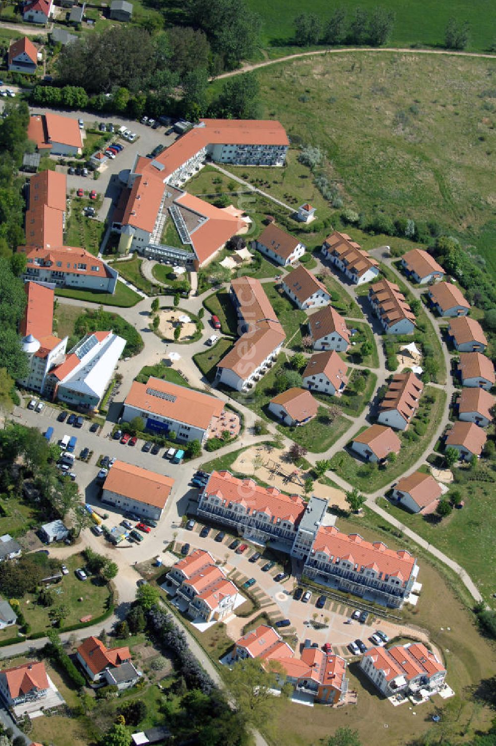 Aerial photograph Rerik - Blick auf die fertige Erweiterungsbaustelle am Feriendorf der AWO-SANO GmbH. Ausführende Baufirma : D. Schröder Bauunternehmung KG Bruehl Hirnsdorfstraße 60, 19412 Brühl, Tel.: 03848320917, Projektsteuerung: Matrix Consultants Planungs mbH, Dr. Ing. Ali Labib M.Mahmoud, Haffwinkel 17 d, 18230 Rerik; http://