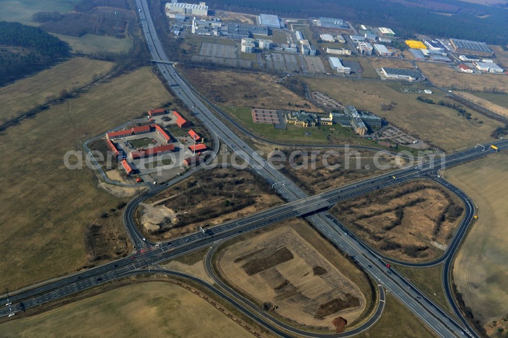 Rangsdorf from the bird's eye view: Finished construction of the expansion slope at the Berliner Ring motorway A10 - E30 at the exit to the main road B96 near Rangsdorf in Brandenburg