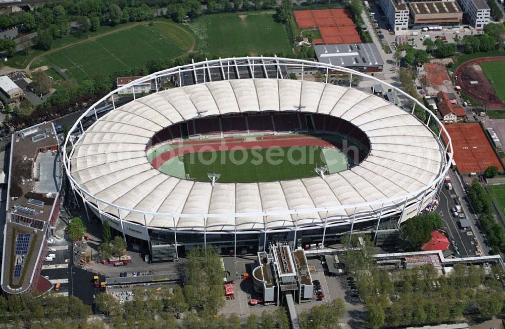 Stuttgart from the bird's eye view: Zur Fußball-Weltmeisterschaft 2006 fertig umgebautes Stadion in Stuttgart. Das Gottlieb-Daimler-Stadion, ehemals Neckarstadion, liegt im rund 55 ha großen Sportzentrum Cannstatter Wasen. Das markanteste Merkmal ist die Stahlseilbinder-Konstruktion des Membrandaches, das die gesamten Zuschauerplätze überspannt.Abteilung Stadien, Bezirks-und Eissportanlagen, Mercedesstraße 87, 70372 Stuttgart, Telefon +49-(0)711-216-4661, Telefax +49-(0)711-216-3326,Architekt: Arat, Siegel & Partner